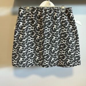 Urban Outfitters textured floral mini skirt.